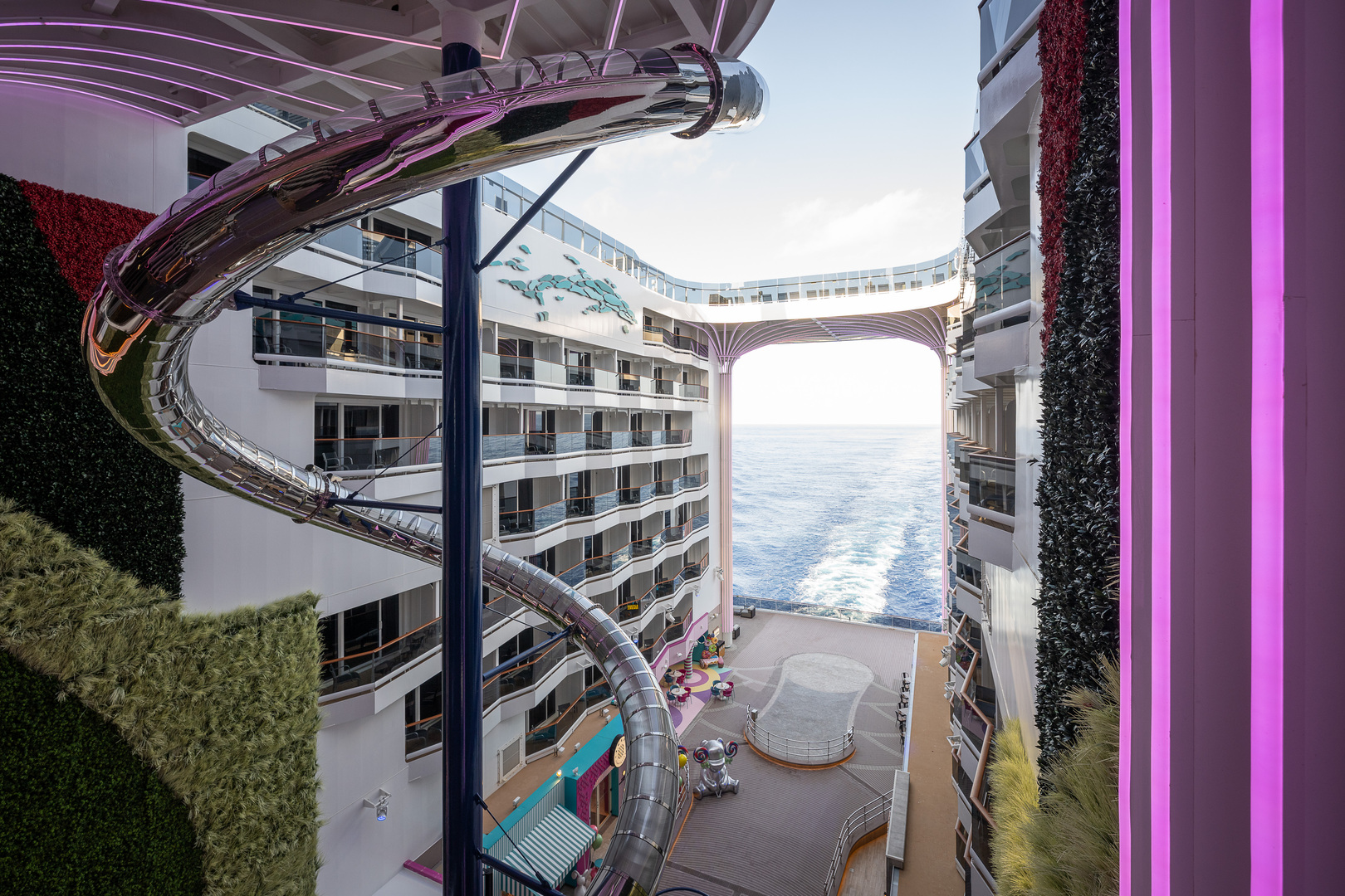 Interior of the MSC World America cruise ship featuring a large metallic slide.